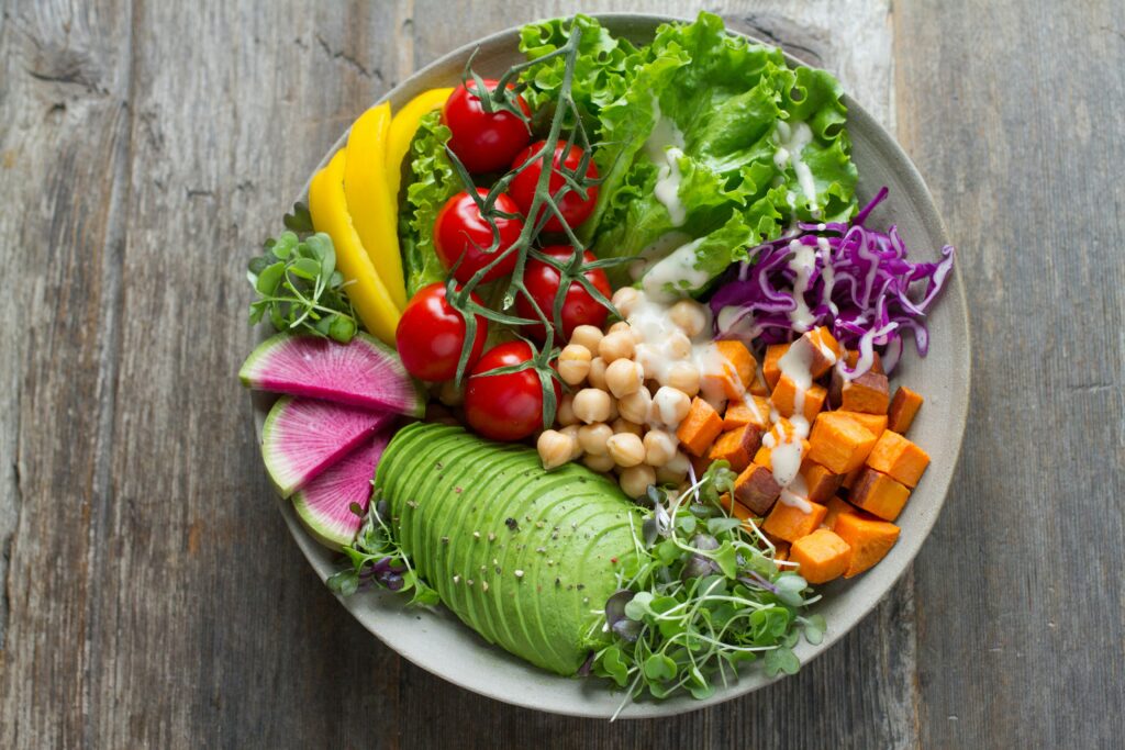 a bowl full of colorful whole plant foods